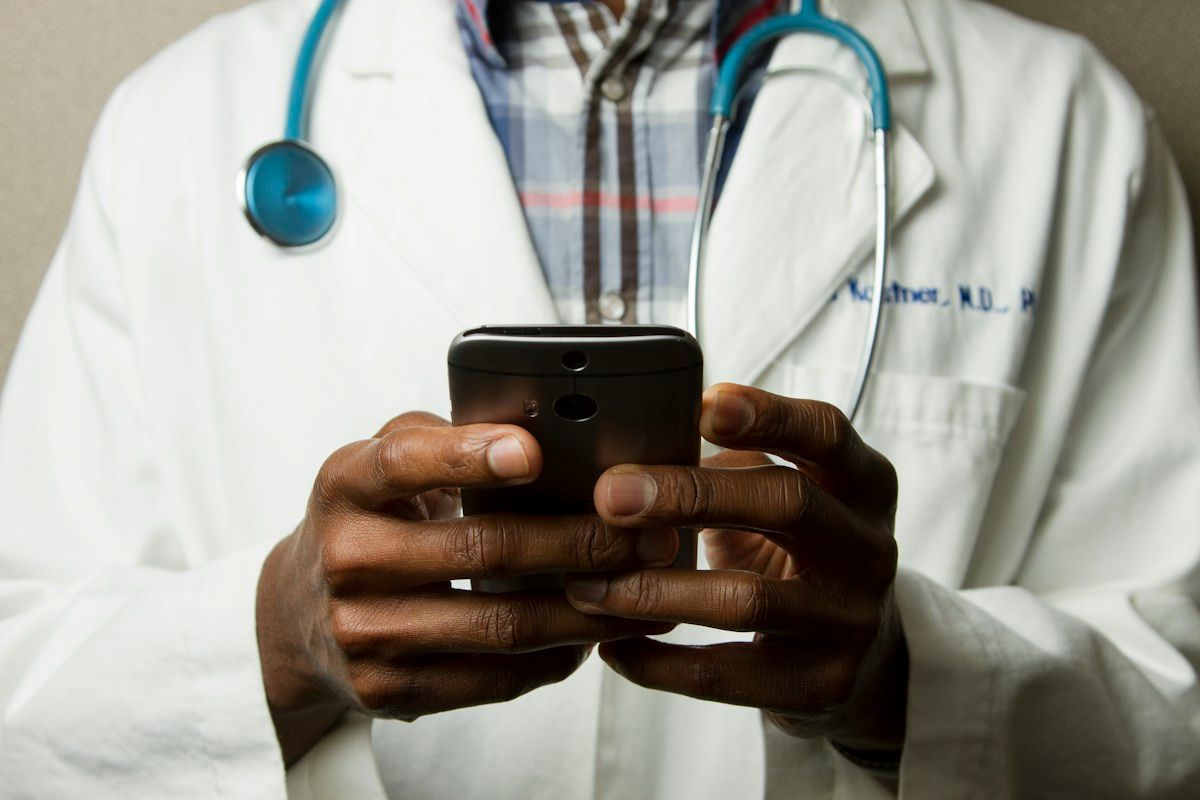 Healthcare professional reviewing patient information